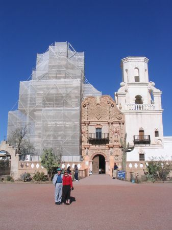 Donna & her grandfather in front of Mission San Javier del Bac, which is under renovation