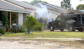 The Swat Team destroys the interior walls with C4 explosive